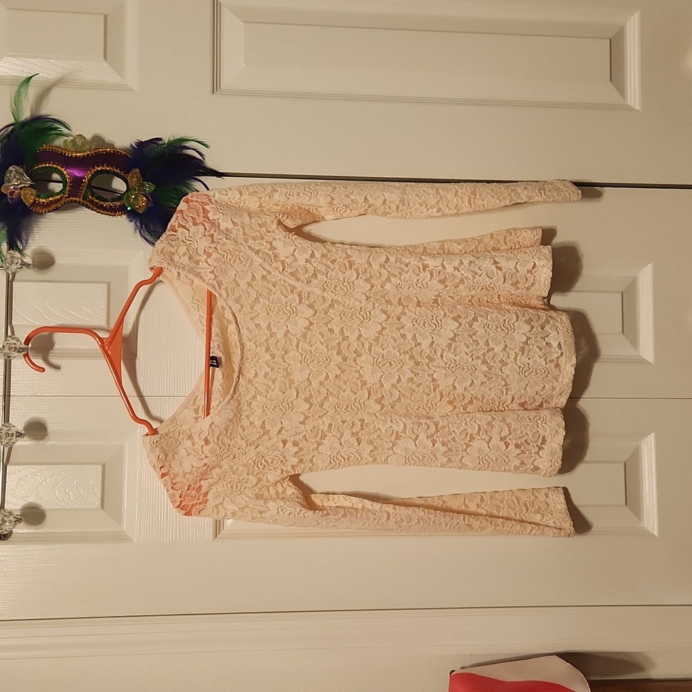 Divided lace peplum top